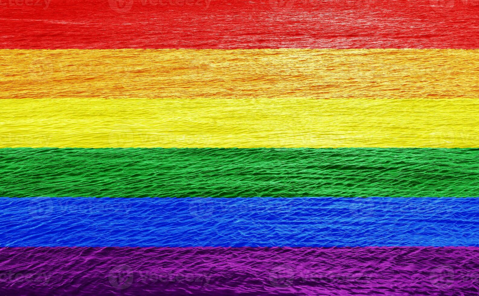 LGBT flag rainbow on water texture. Conceptual collage. photo