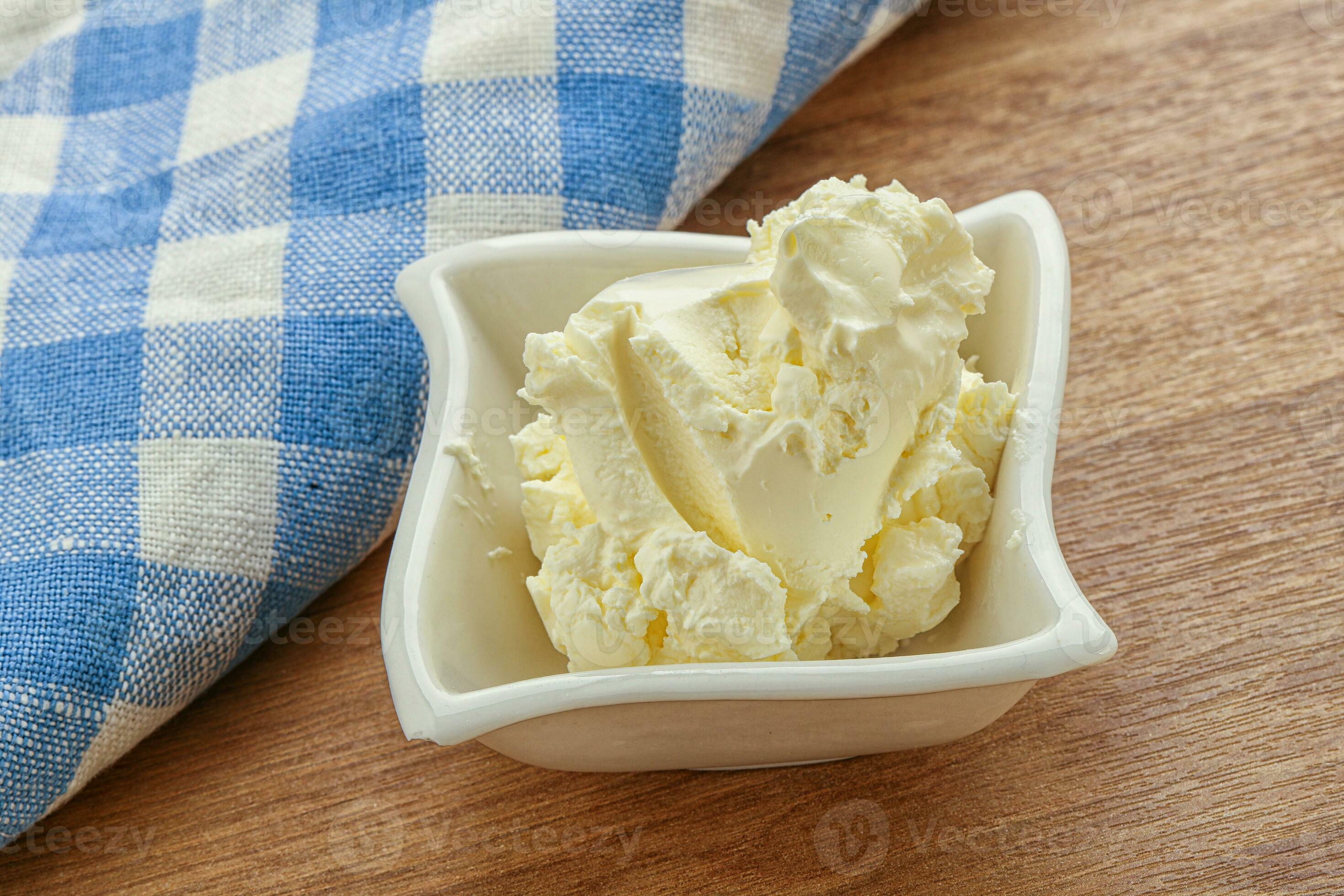 Italian soft mascarpone cheese in the bowl 34057523 Stock Photo at Vecteezy