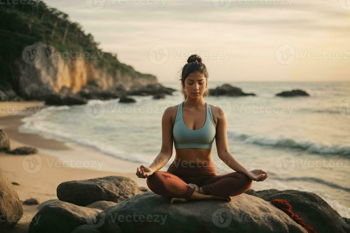 A young woman meditating on a rock at the seashore on the beach, practicing mindfulness and focused breathing to improve her mental well-being. AI Generative photo