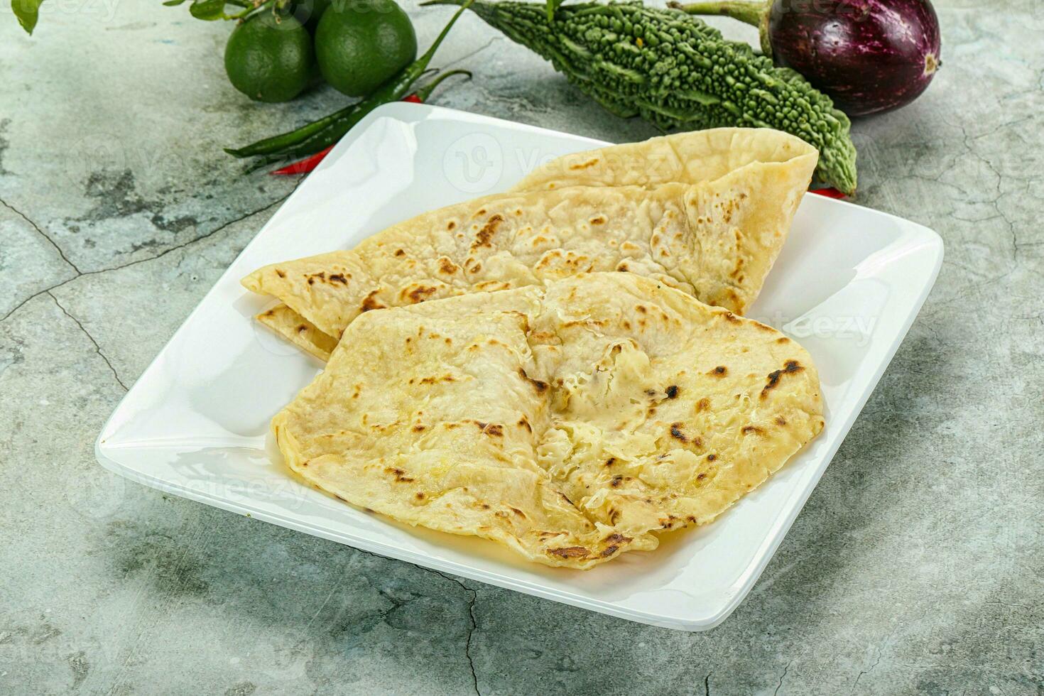 indio tandori un pan - naan con queso foto