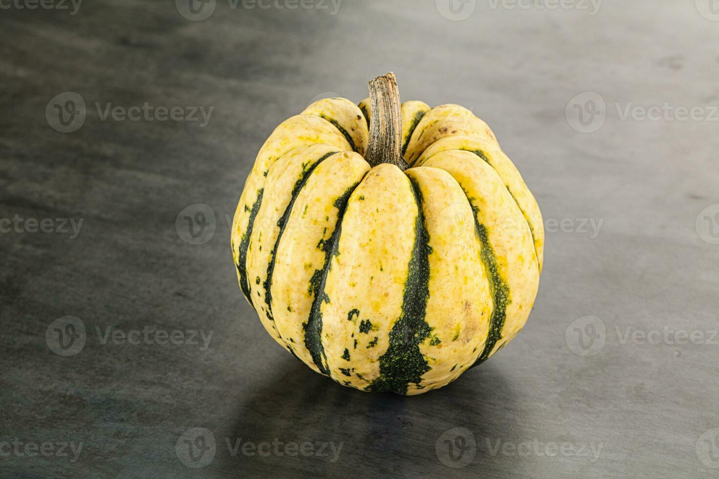 Ripe raw fresh decorative pumpkin photo