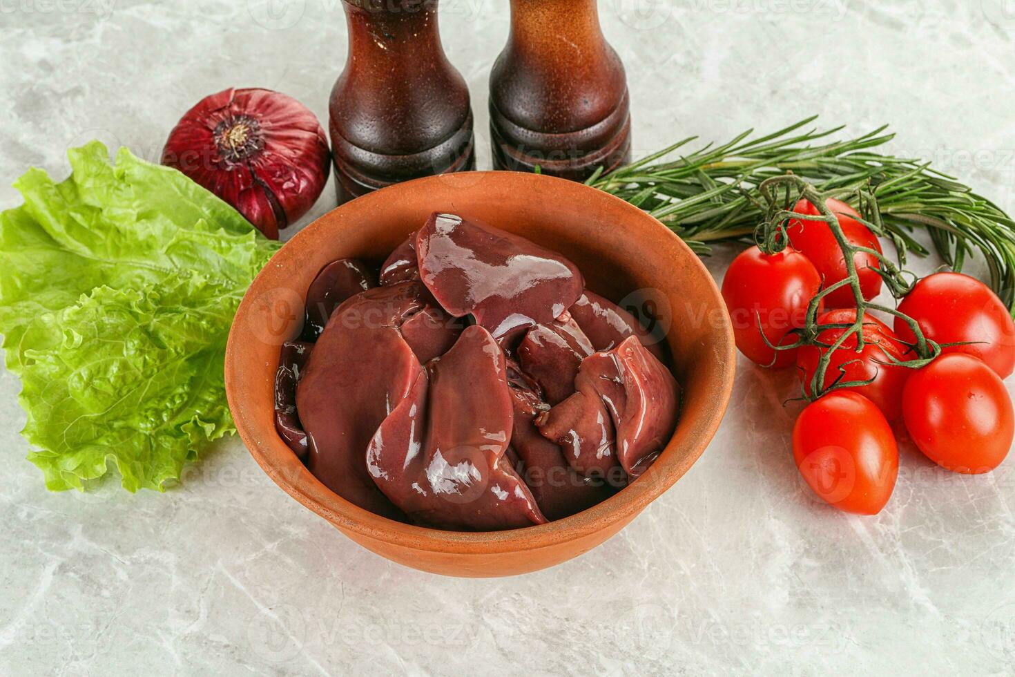 Raw turkey liver in a bowl ready for cooking photo