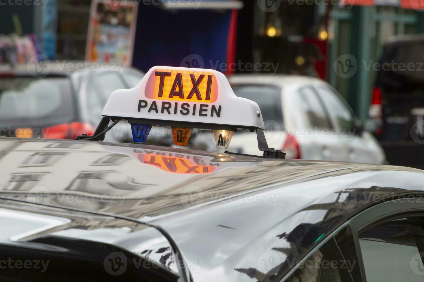 top light box on taxi in Paris photo