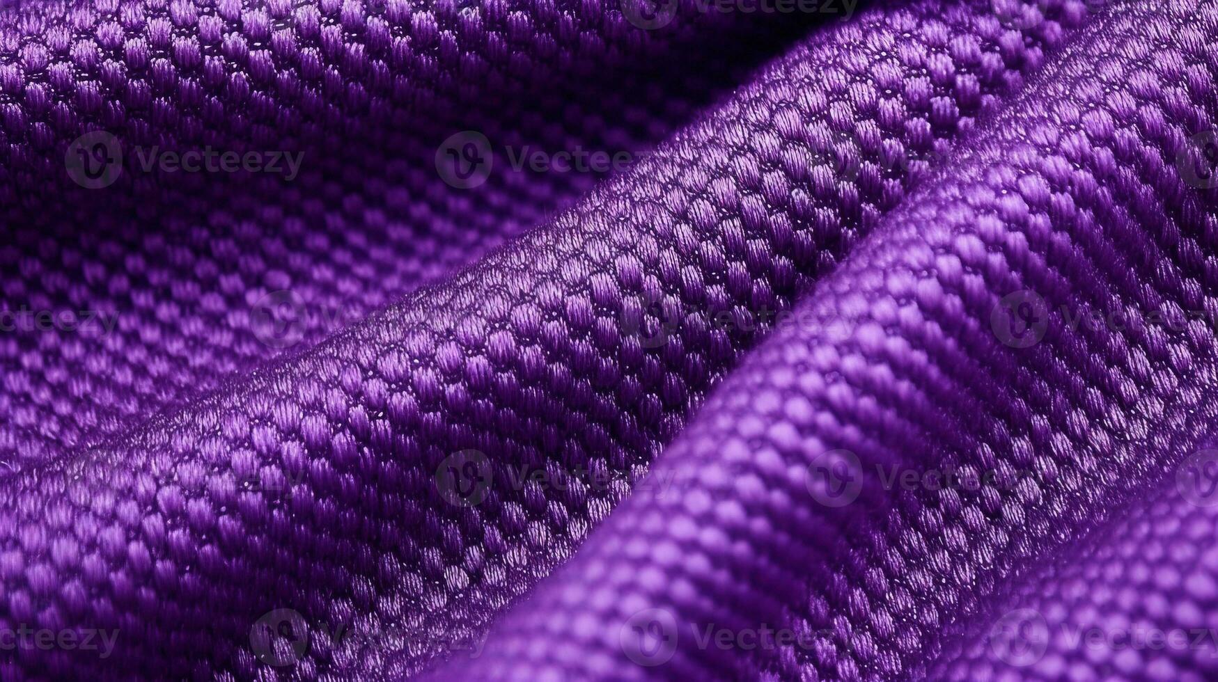 Purple soccer fabric texture with air mesh. Sportswear background photo