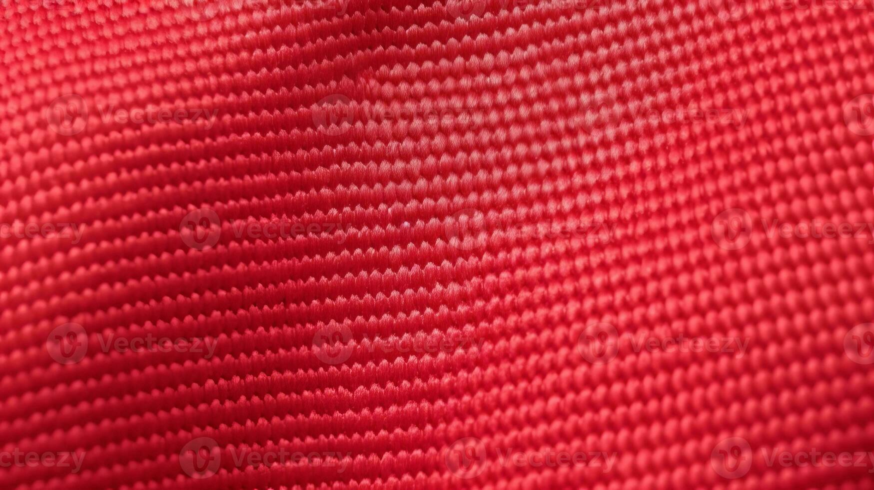 Red soccer fabric texture with air mesh. Athletic wear backdrop photo