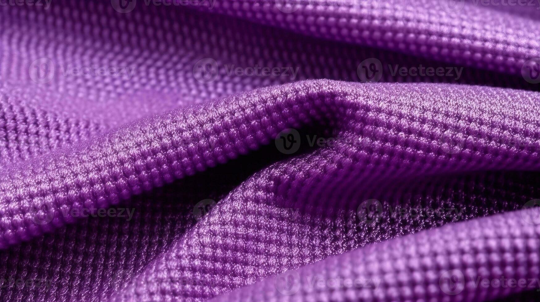 Purple soccer fabric texture with air mesh. Sportswear background photo