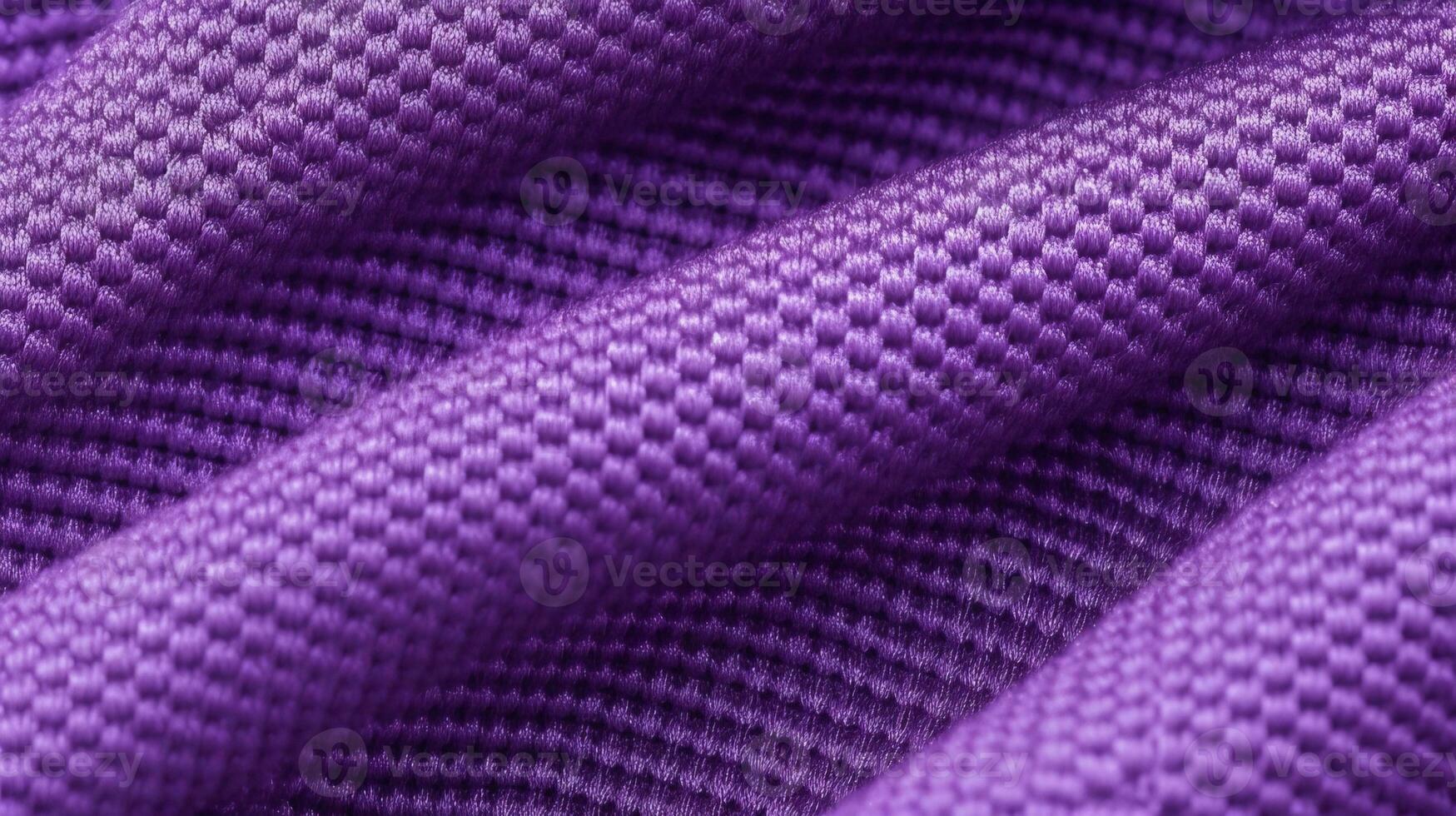 Purple soccer fabric texture with air mesh. Sportswear background photo