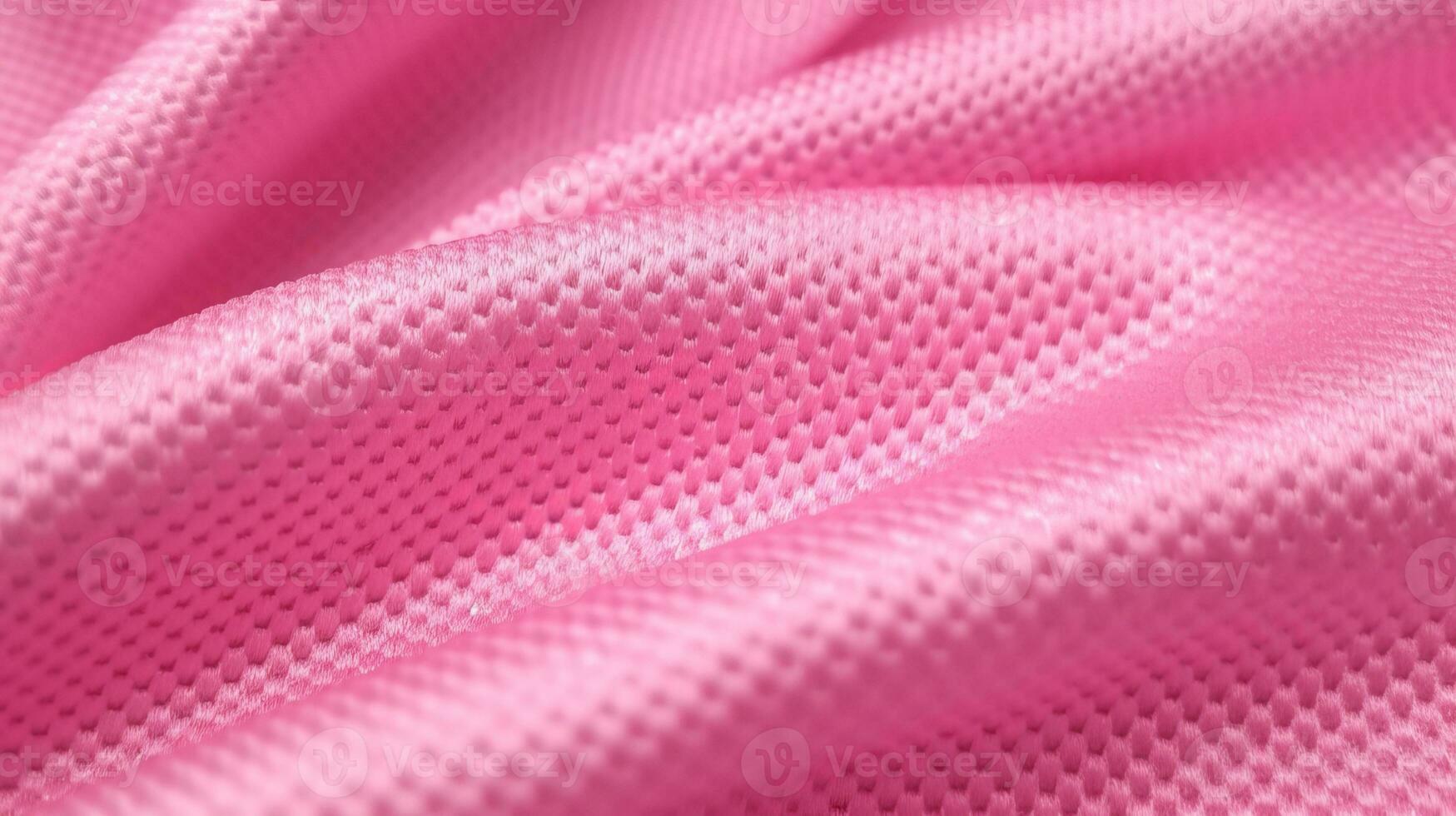 Pink soccer fabric texture with air mesh. Athletic wear backdrop photo