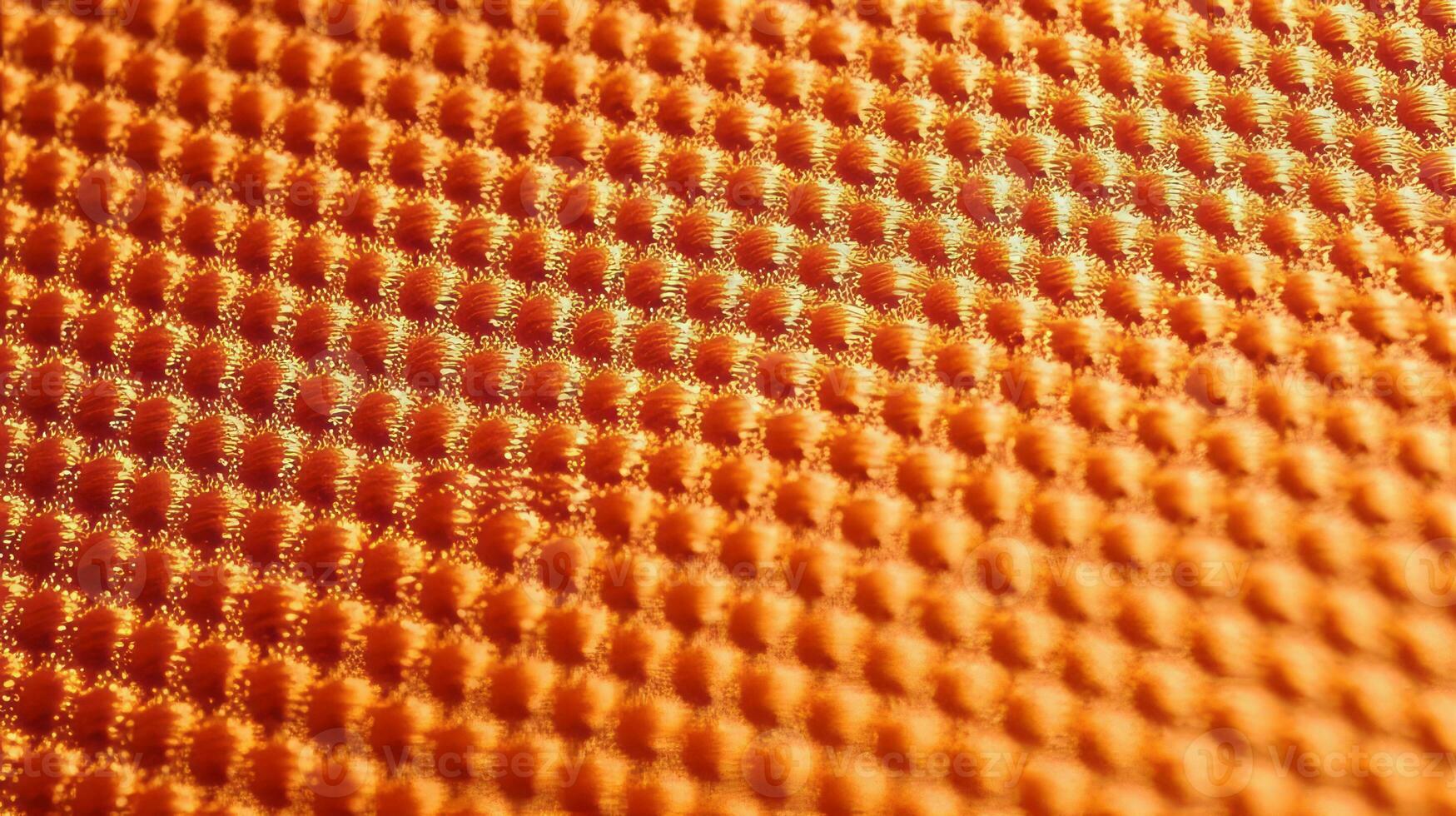 Orange soccer fabric texture with air mesh. Sportswear background photo