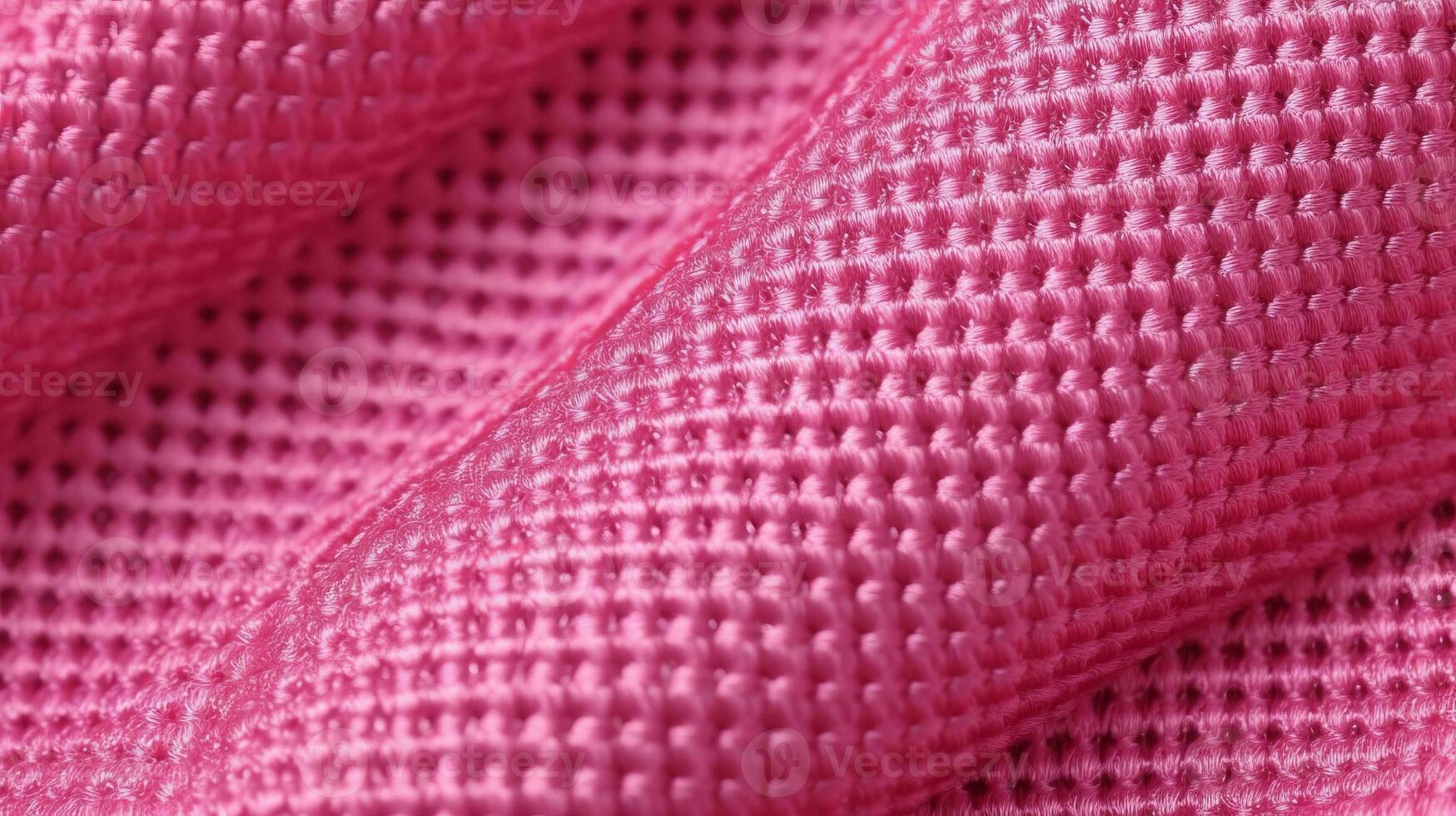Pink soccer fabric texture with air mesh. Athletic wear backdrop photo
