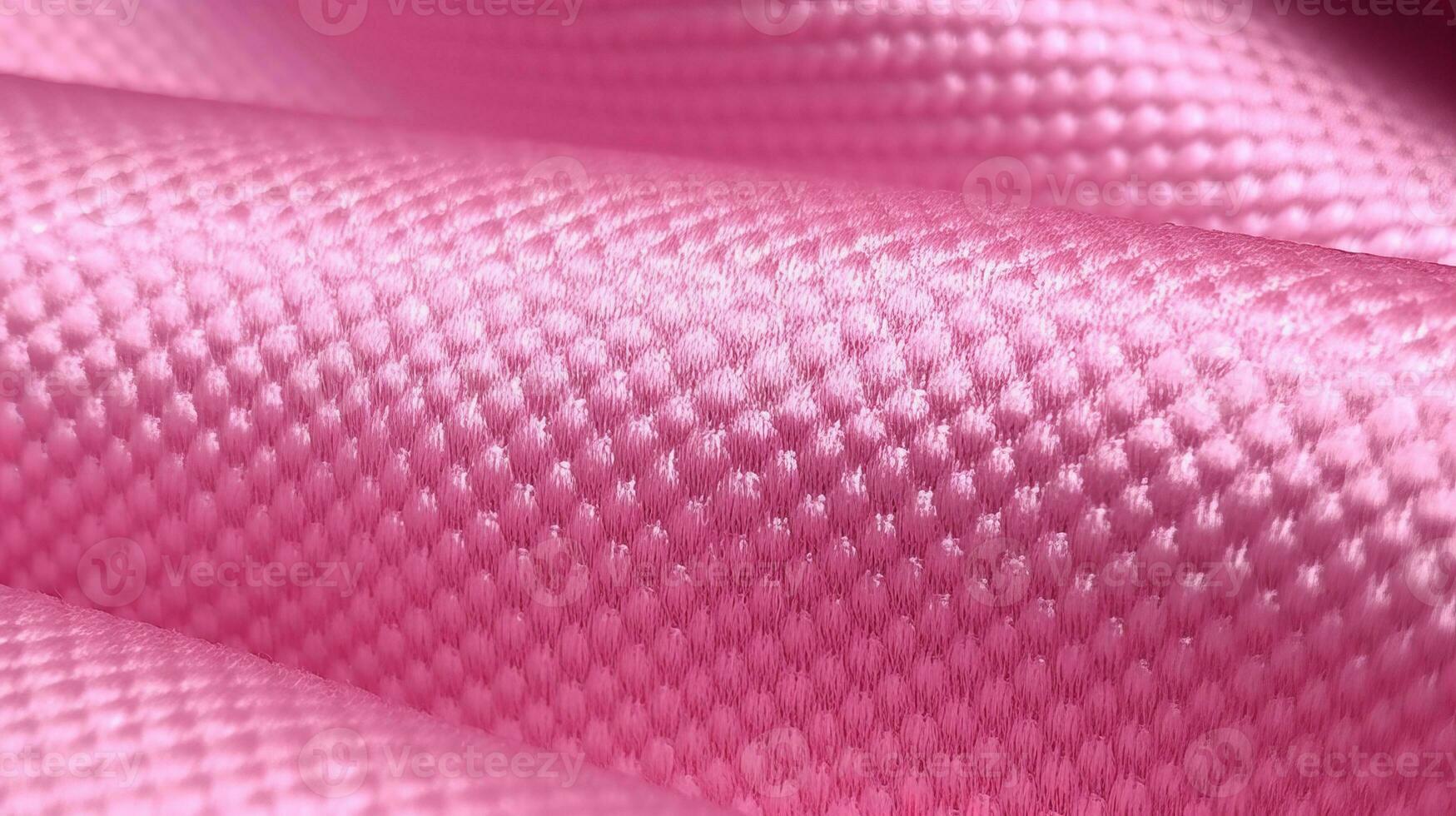 Pink soccer fabric texture with air mesh. Athletic wear backdrop photo