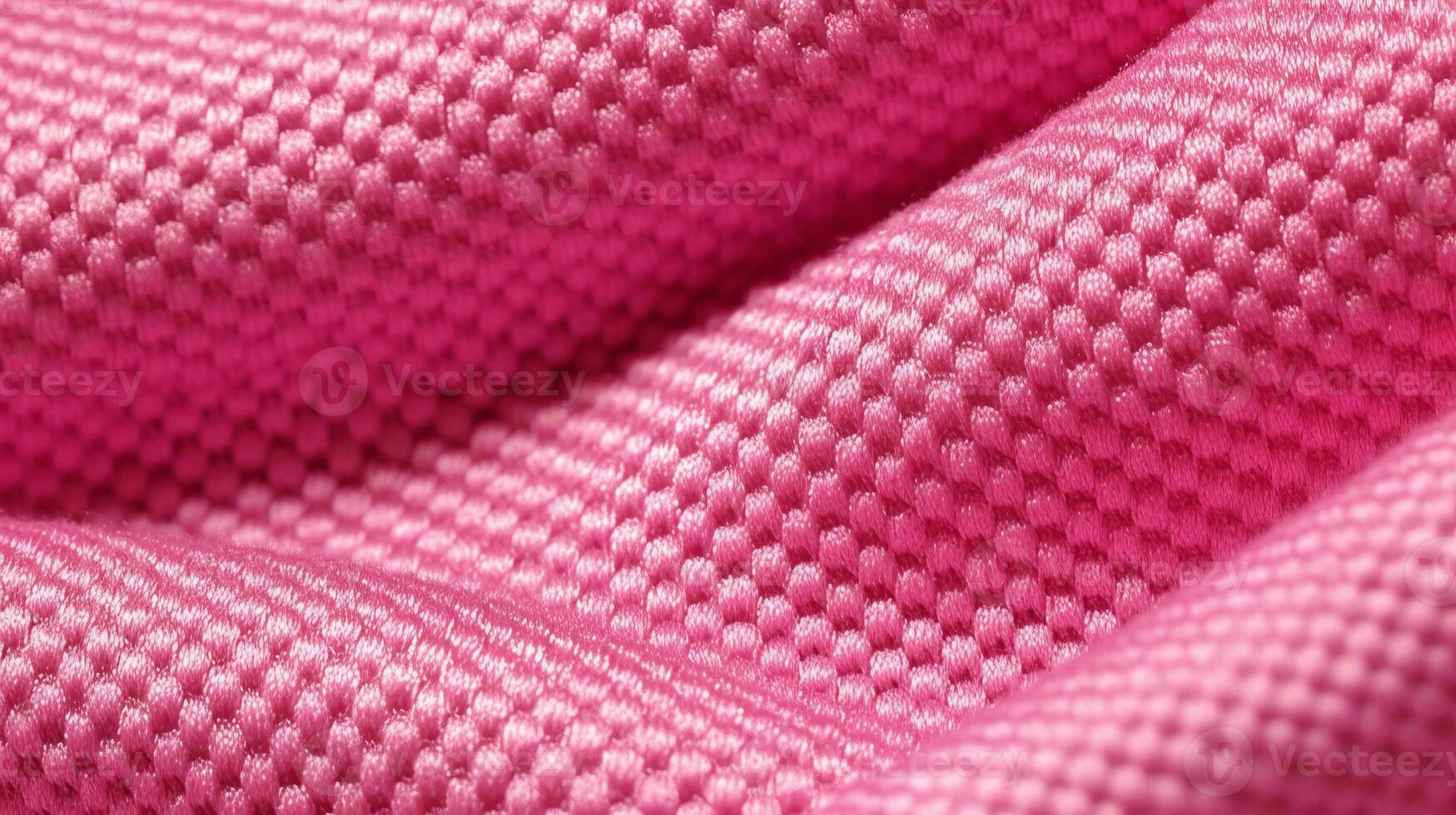 Pink soccer fabric texture with air mesh. Sportswear background photo