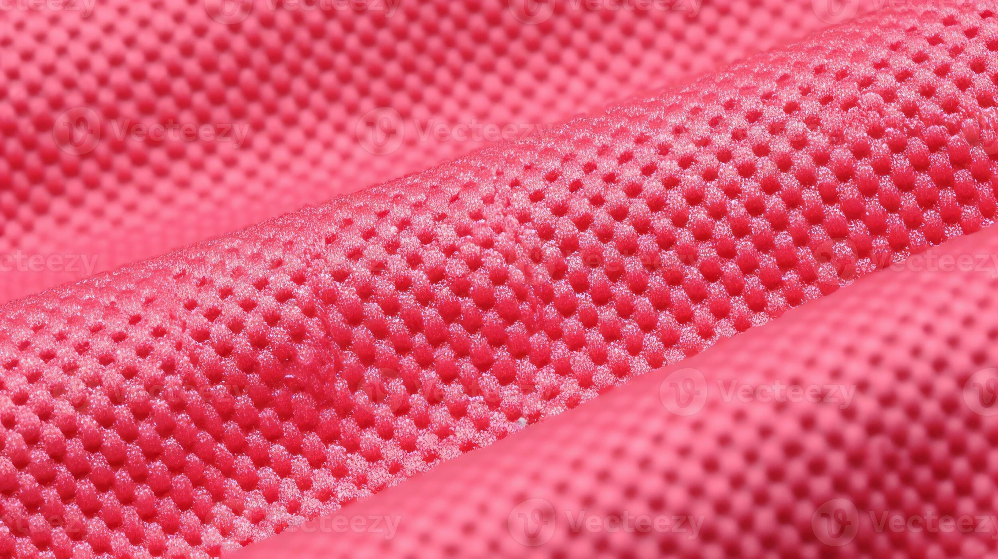 Pink football uniform with air mesh texture. Sportswear background
