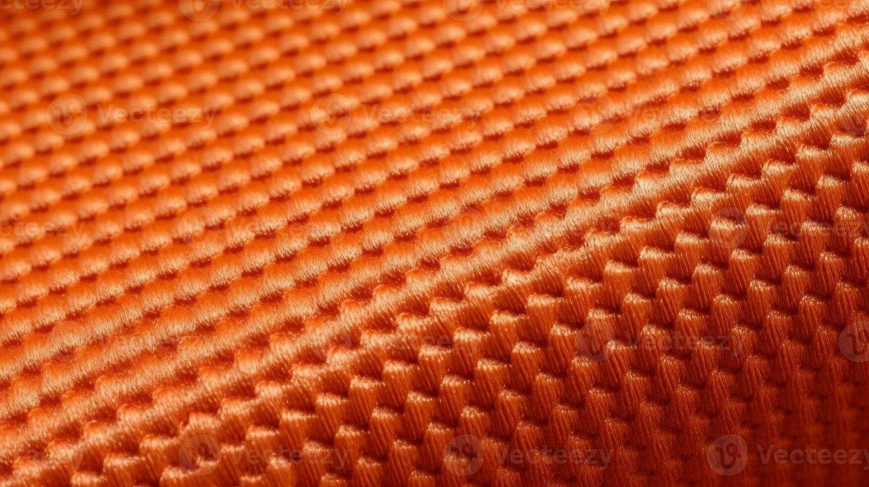 Orange soccer fabric texture with air mesh. Sportswear background photo