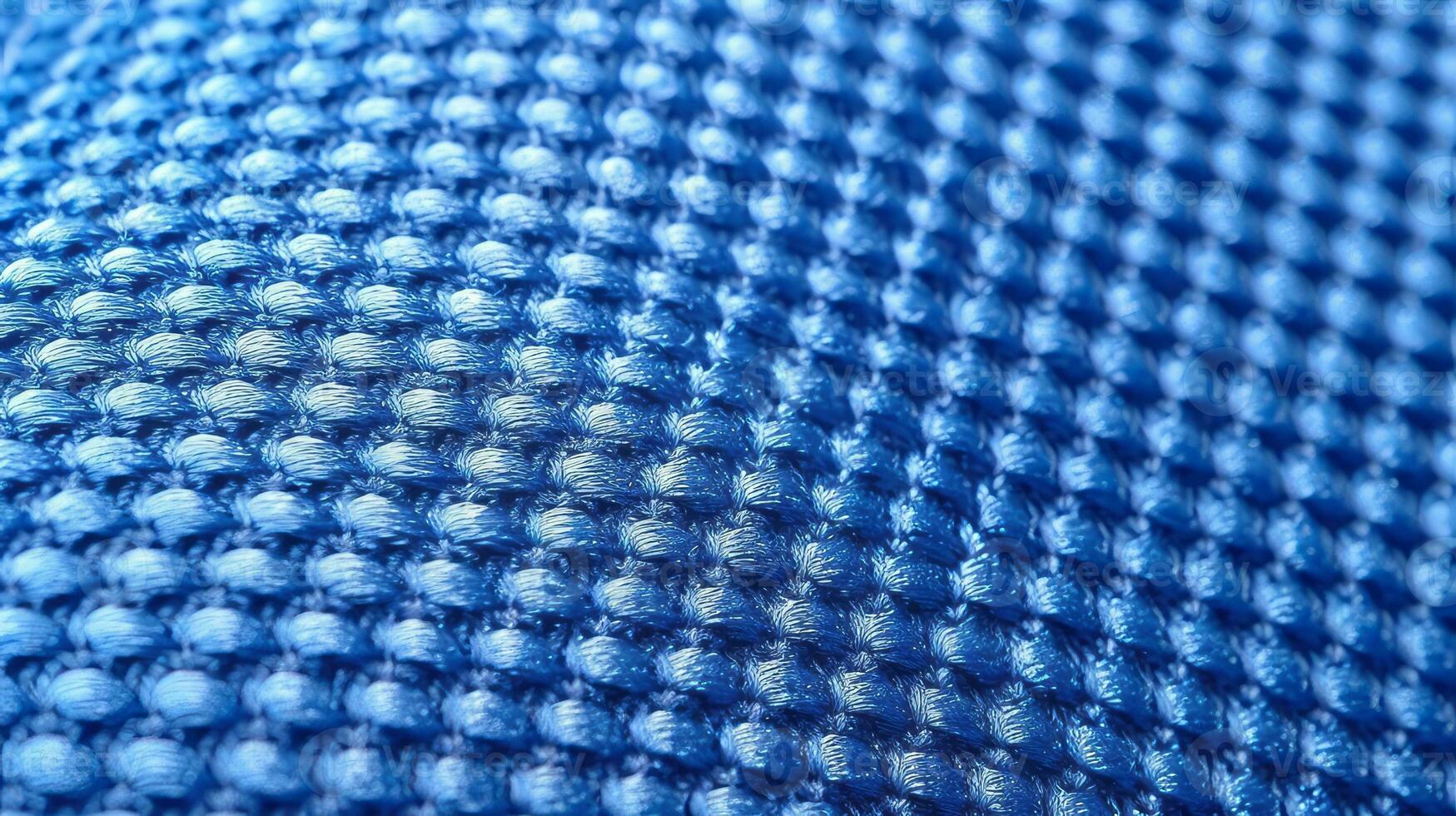 Blue soccer fabric texture with air mesh. Sportswear background photo