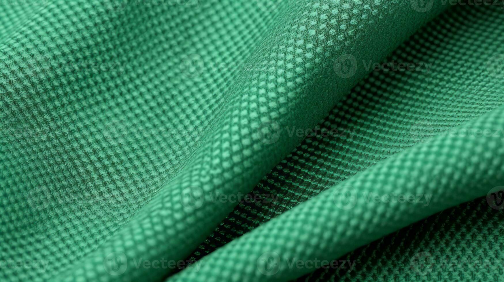 Green soccer fabric texture with air mesh. Athletic wear backdrop photo