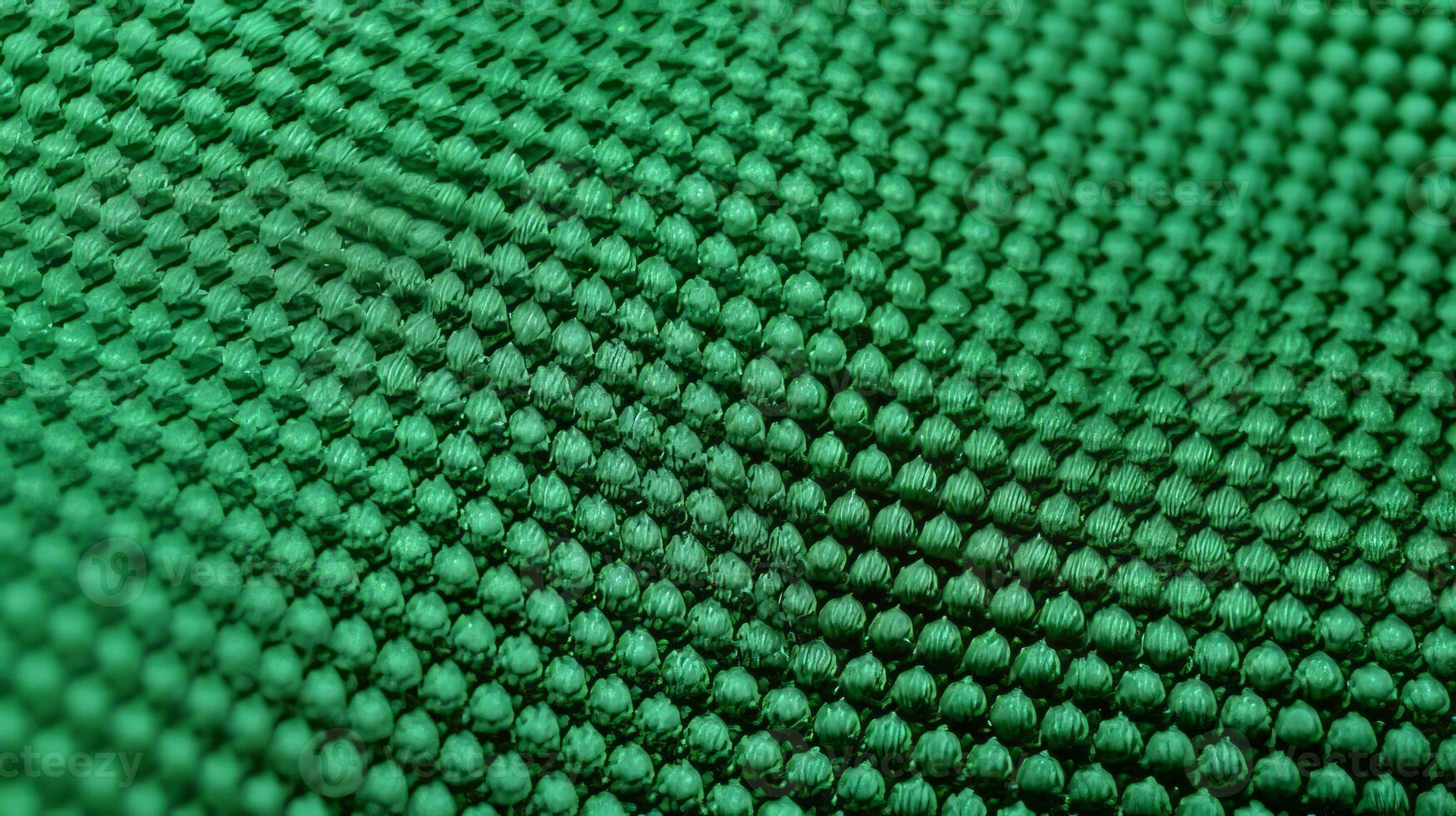 Green soccer fabric texture with air mesh. Athletic wear backdrop photo