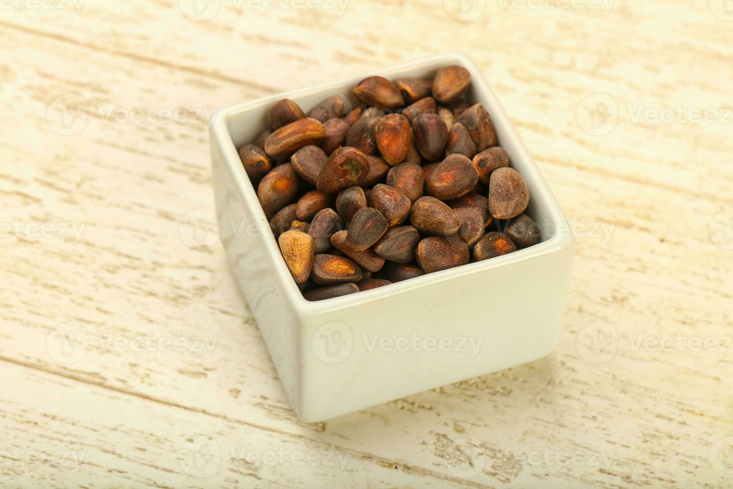 Cedar nuts in the bowl photo