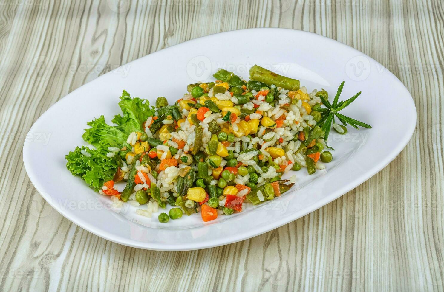 Mexican rice over wooden photo