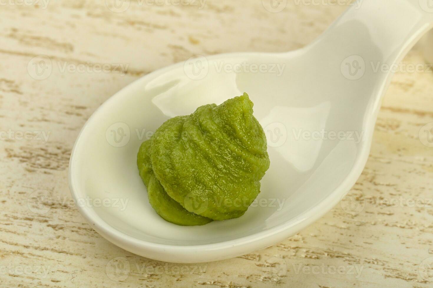 Wasabi over wooden photo