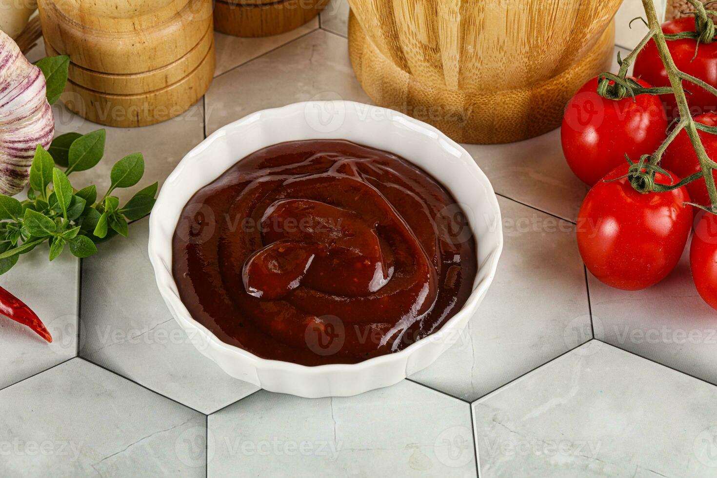 Tasty barbecue sauce in the bowl photo