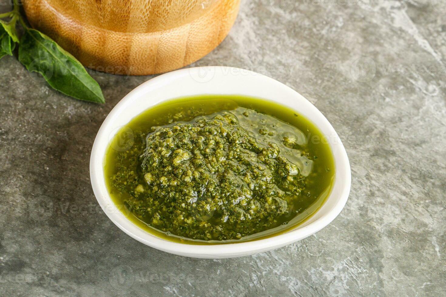 Homemade vegetarian basil pesto sauce photo