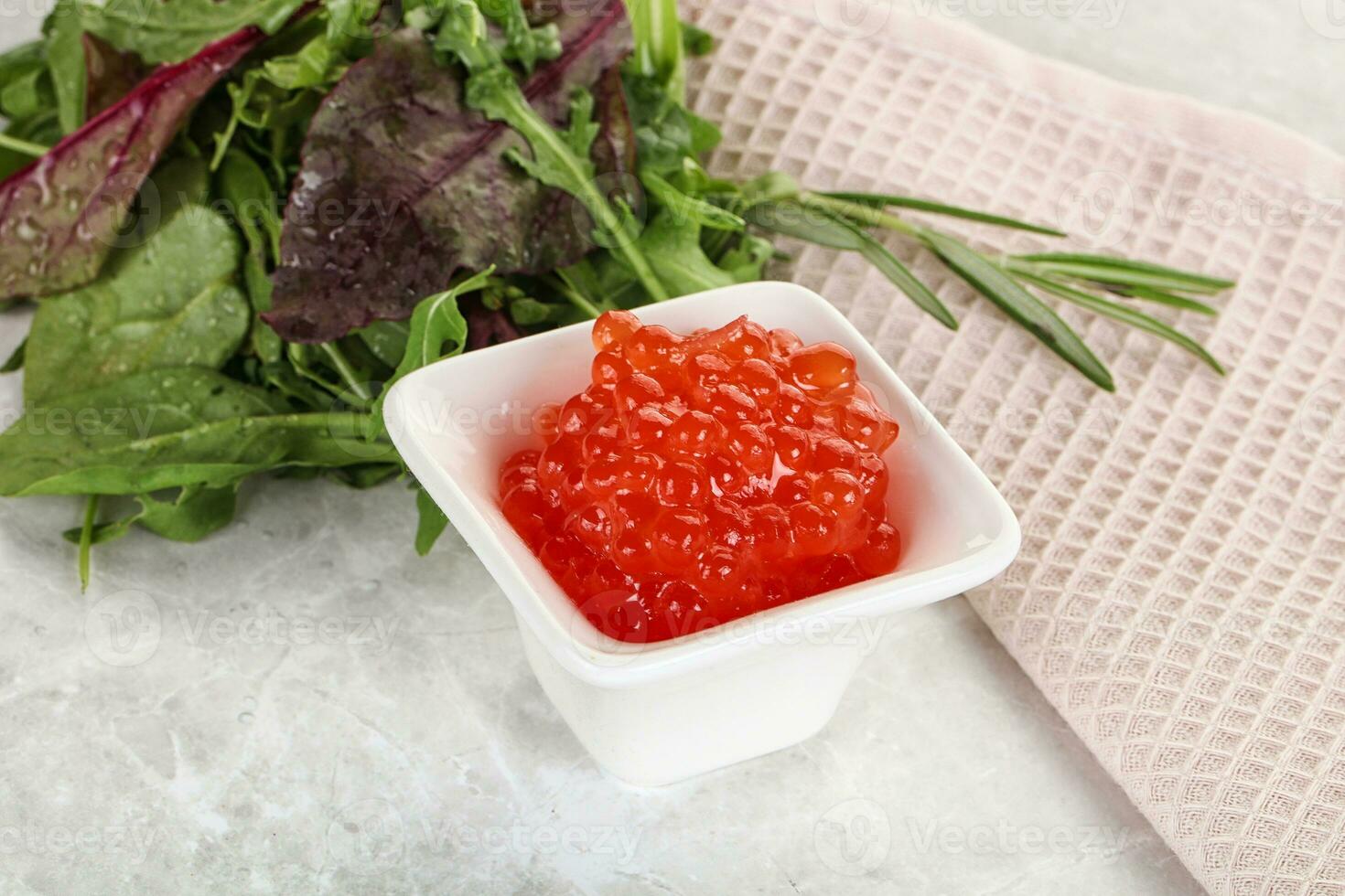 Red caviar in the bowl photo