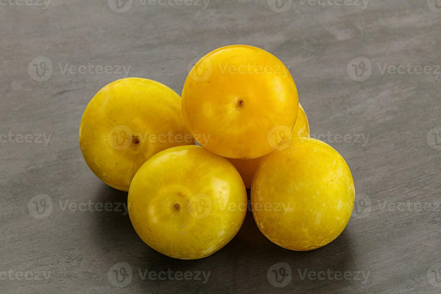 Yellow sweet plum heap fruit photo