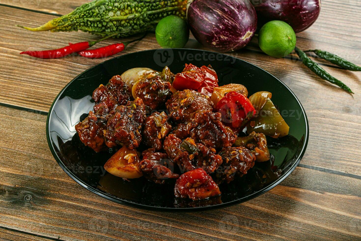 Asian cuisine - pork with chili sauce photo