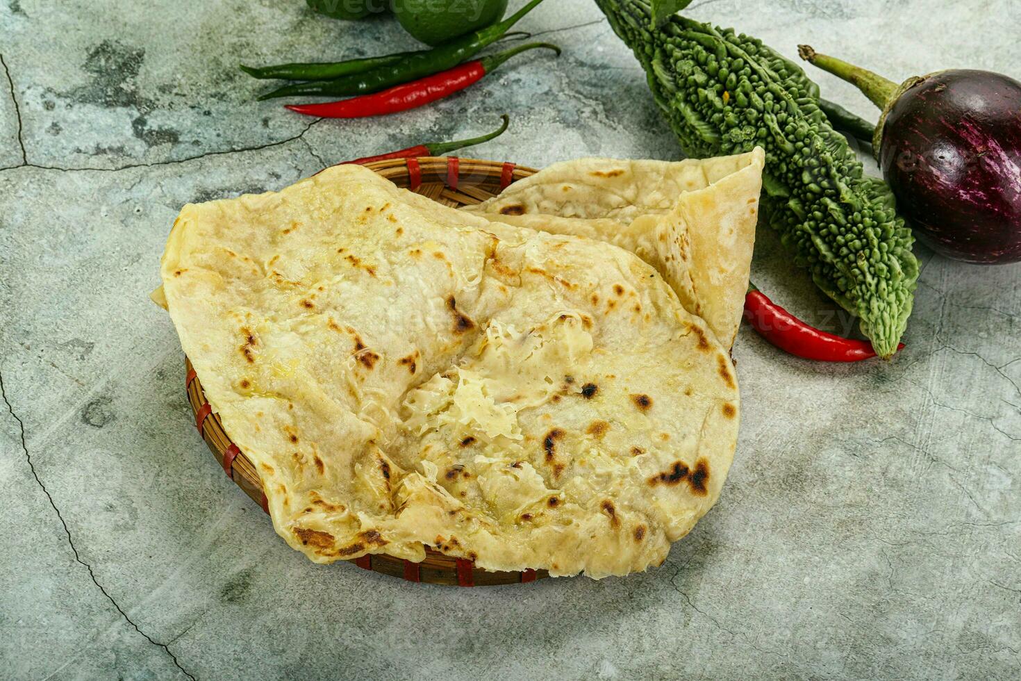 Indian tandori bread - naan with cheese photo