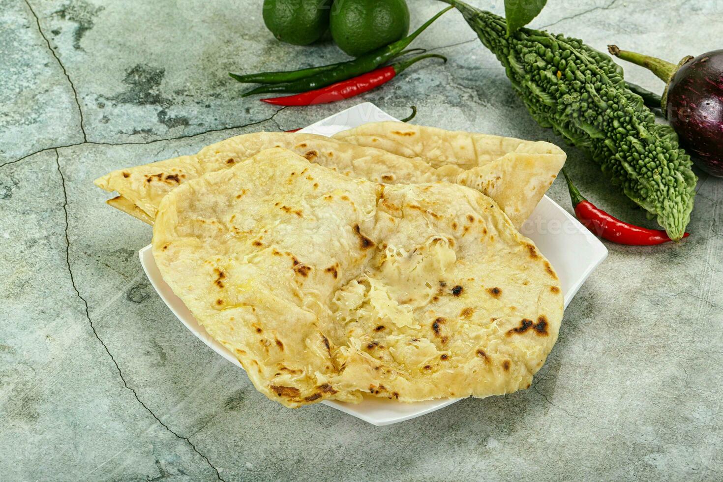 Indian tandori bread - naan with cheese photo
