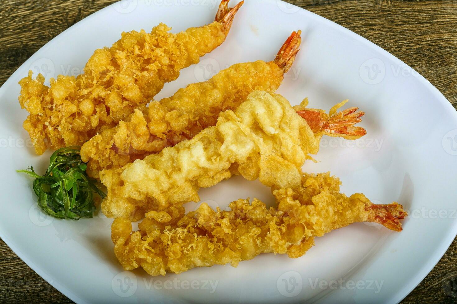 Prawn tempura on wooden background photo