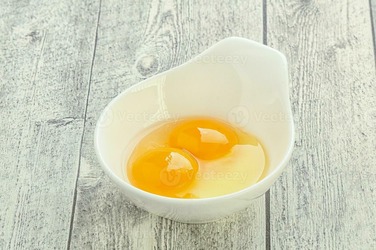 Chicken egg in the bowl photo