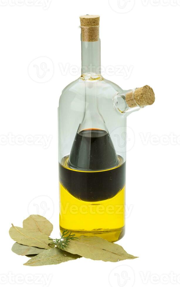 Vinegar, olive oil and laurel photo