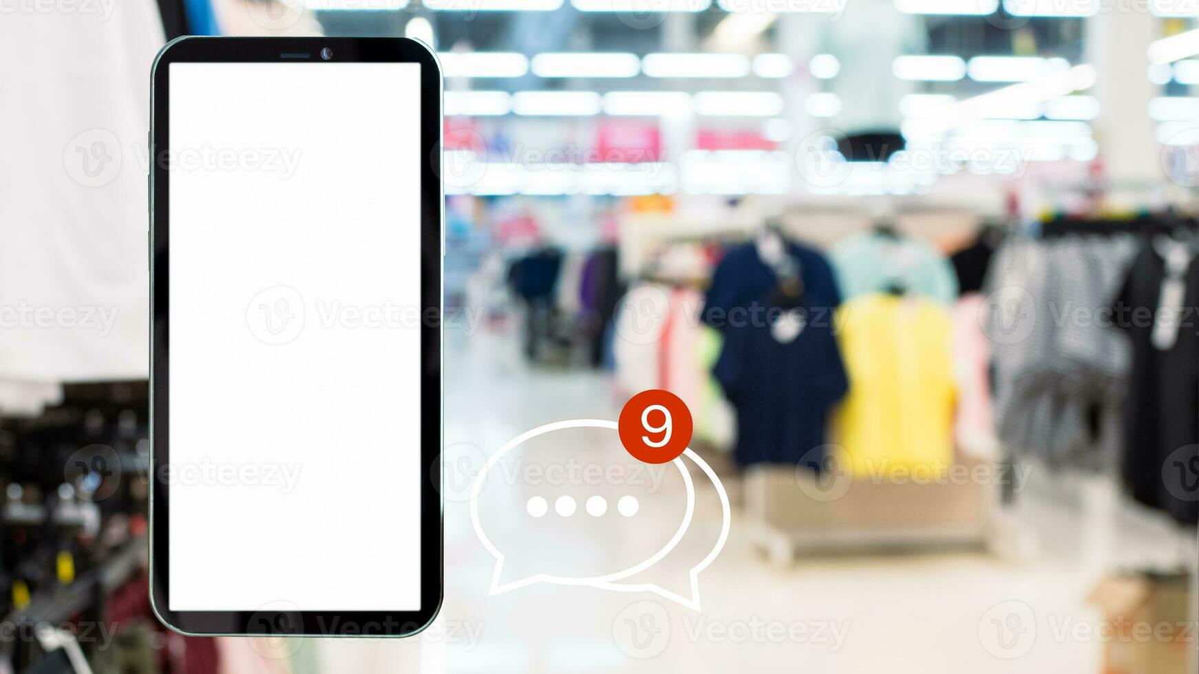 White screen smartphone with message icons isolated on background inside shopping mall. online shopping Website, marketplace platform, e-commerce technology and online payment concepts. photo