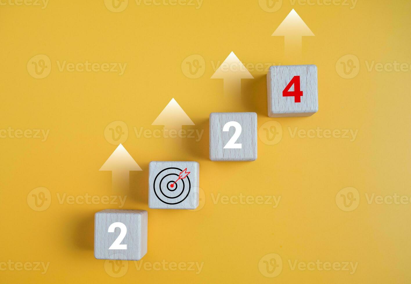 Wooden blocks lined up with the letters 2024. Represents the goal setting for 2024, the concept of a start and financial planning development strategy business goal setting photo