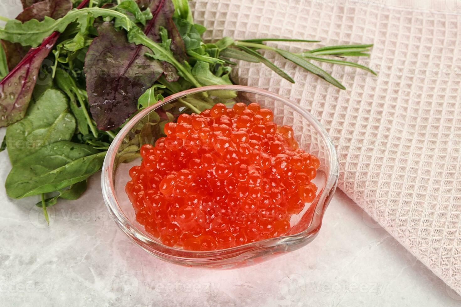 Red caviar in the bowl photo