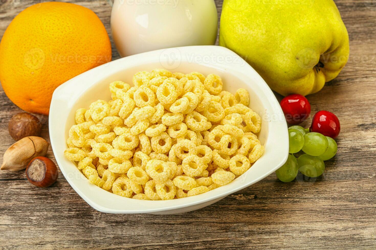 Breakfast with corn rings and milk photo