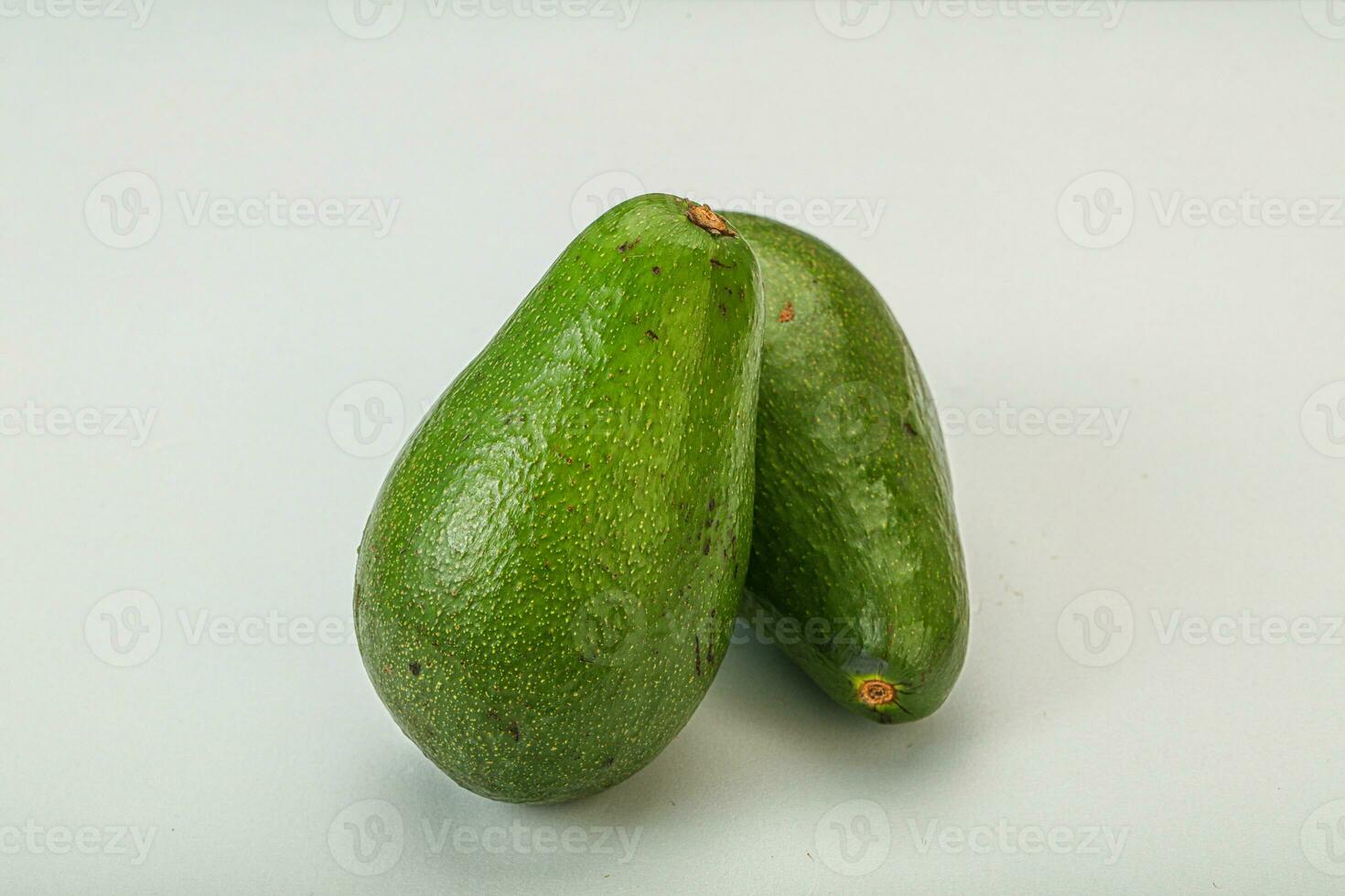 Two ripe exotic avocado vegetable photo