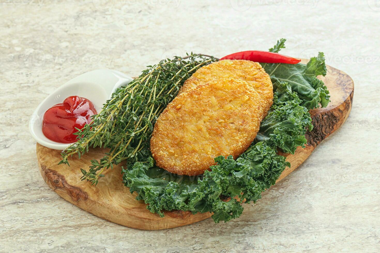 Fried crusty potato hashbrown pancake photo