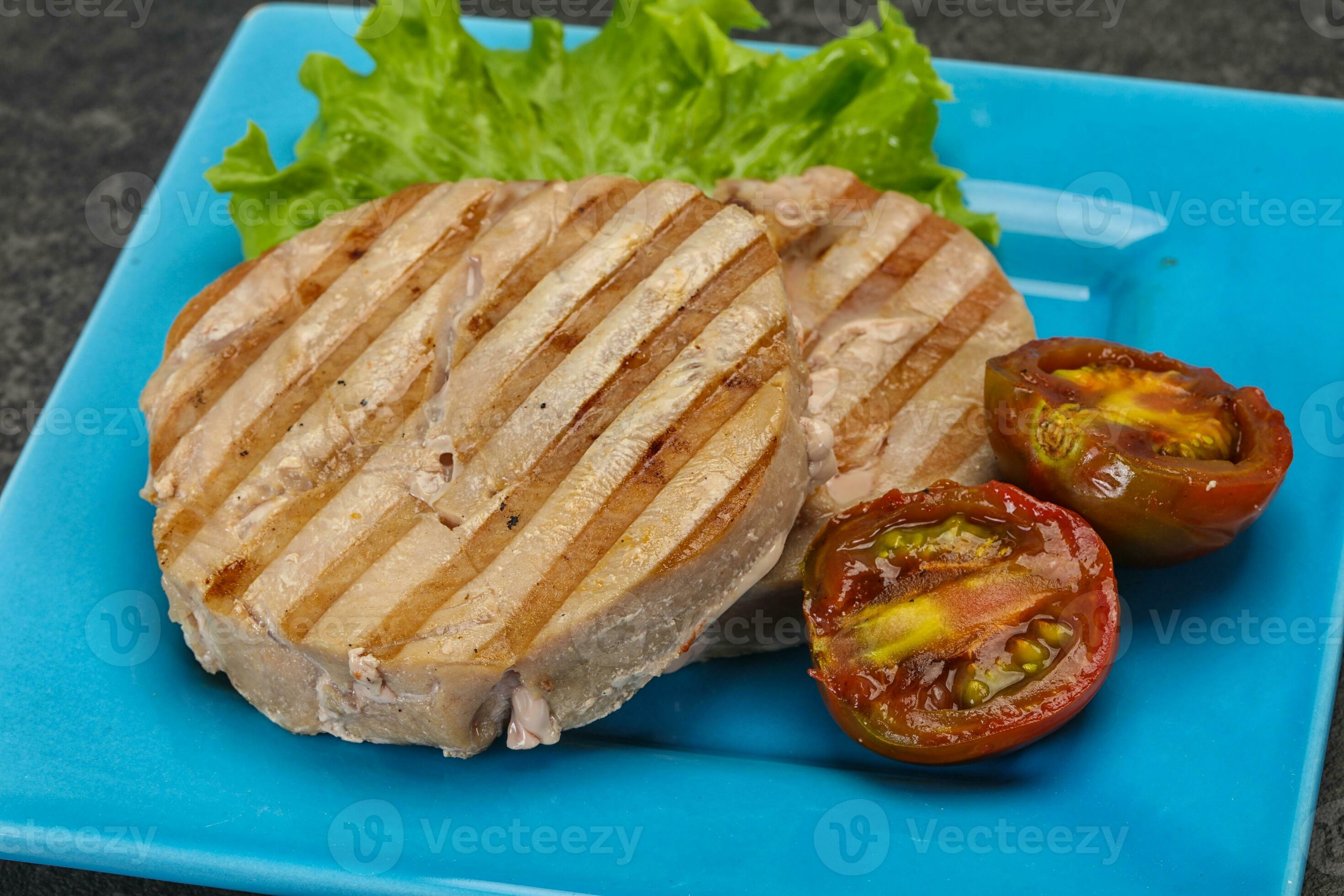 Grilled tuna steak with kumato 34071508 Stock Photo at Vecteezy