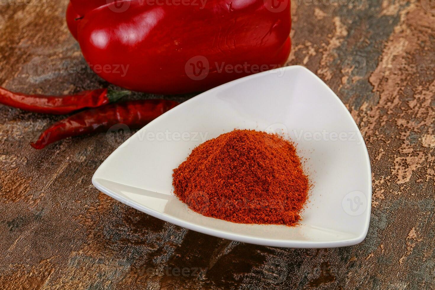 Paprika powder in the bowl photo