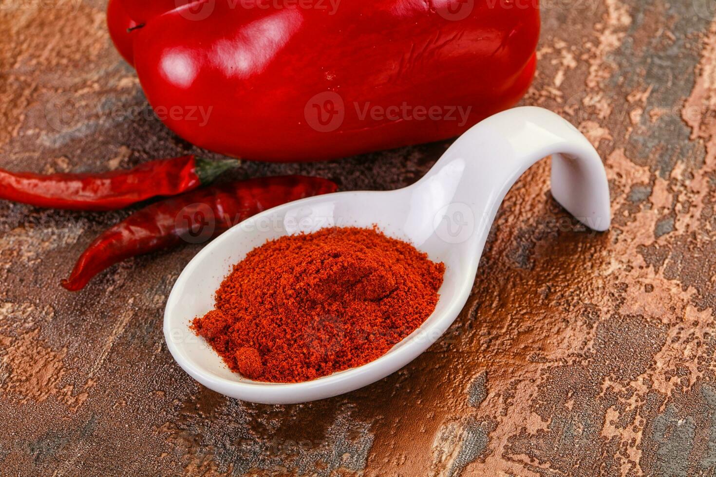 Paprika powder in the bowl photo