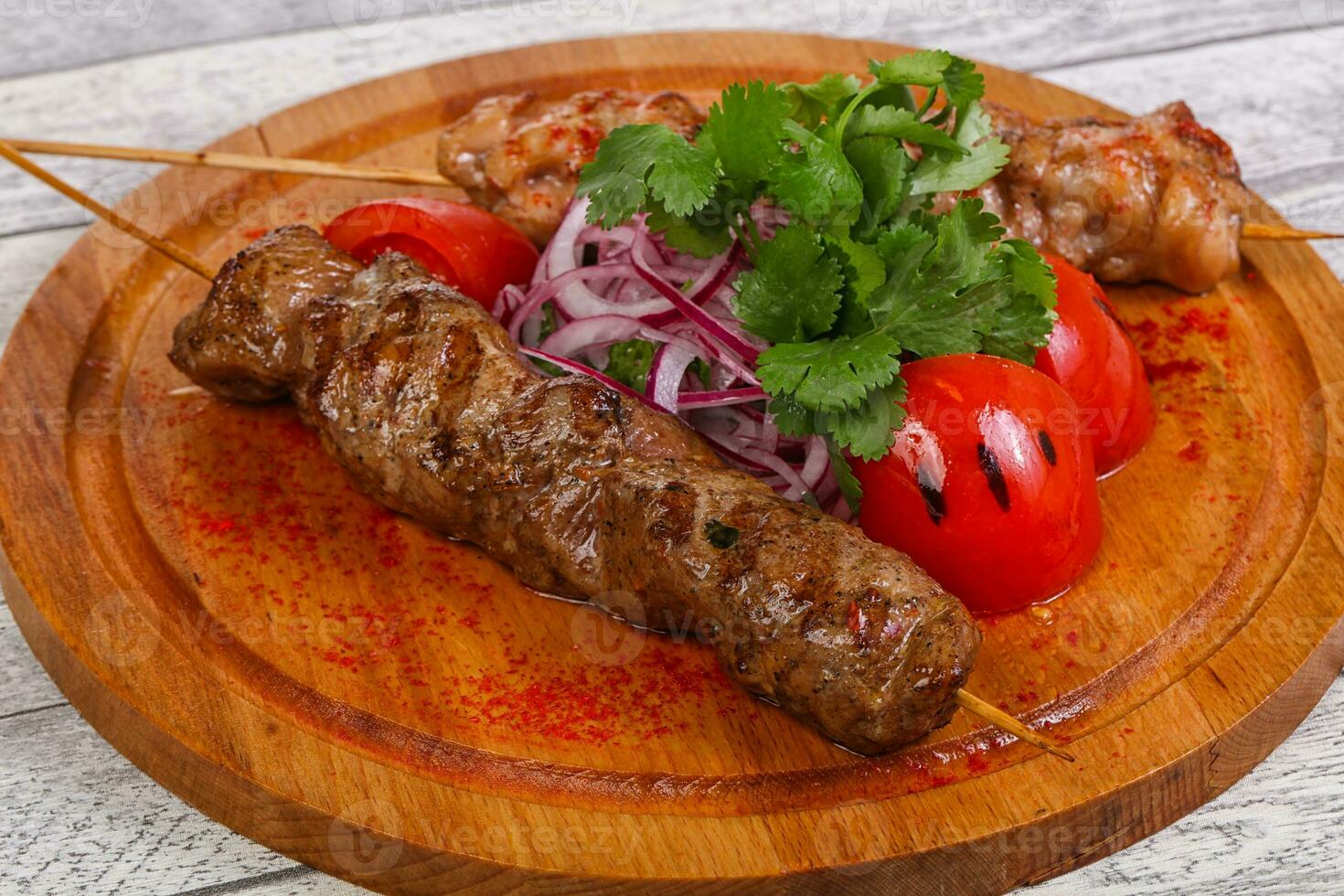 Chicken and beef skewers photo