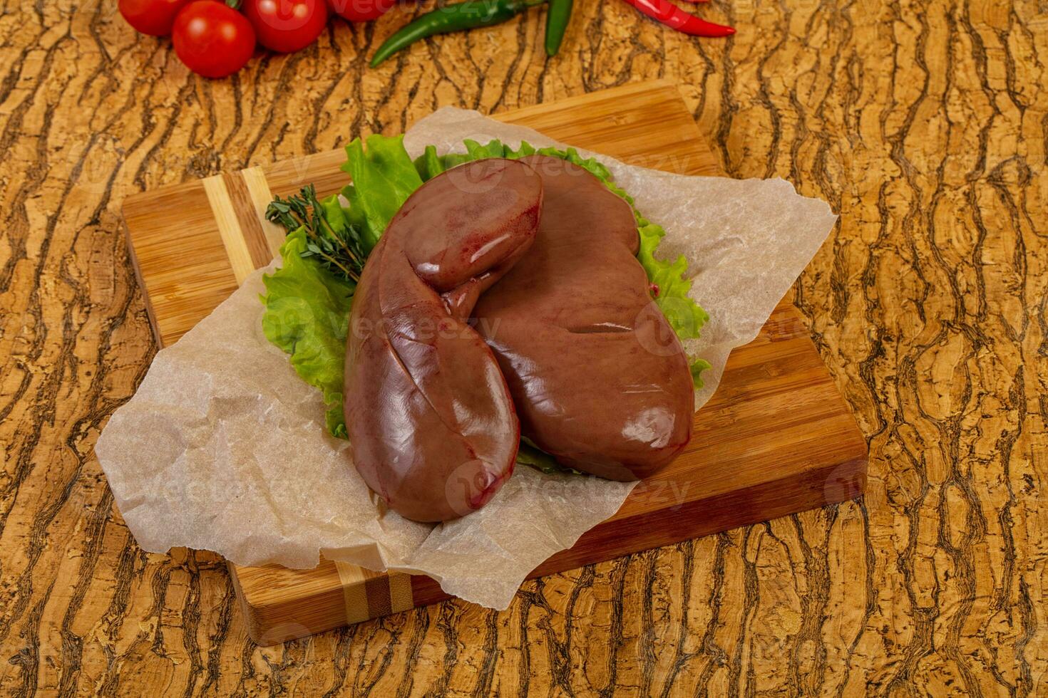 Raw pork kidneys photo