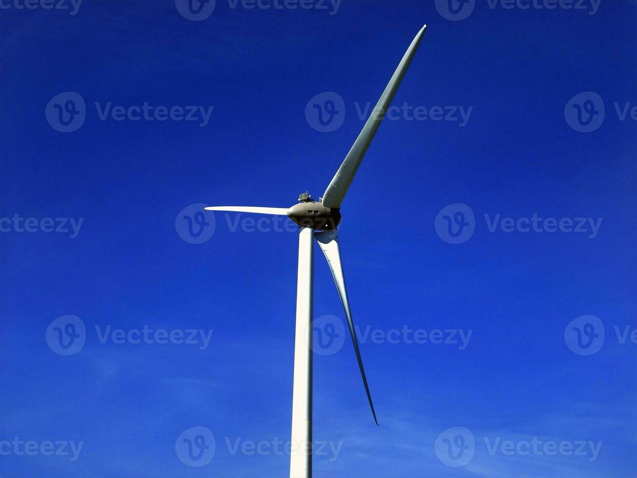 Wind power plant rotor close view. Windpower generator. Green energy, eco friendly industry concept photo