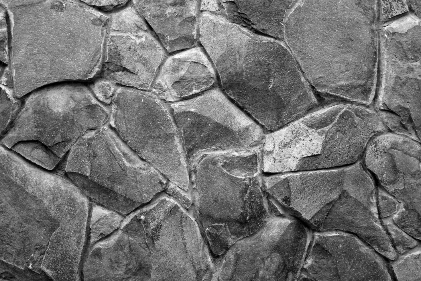 Seamless stone pattern. Old stone wall black and white monochrome texture photo