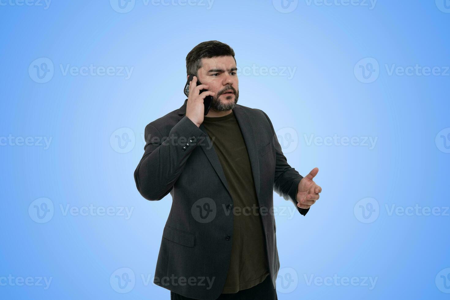 Professional Businessman Talking on Smartphone Under Clear Blue Sky photo