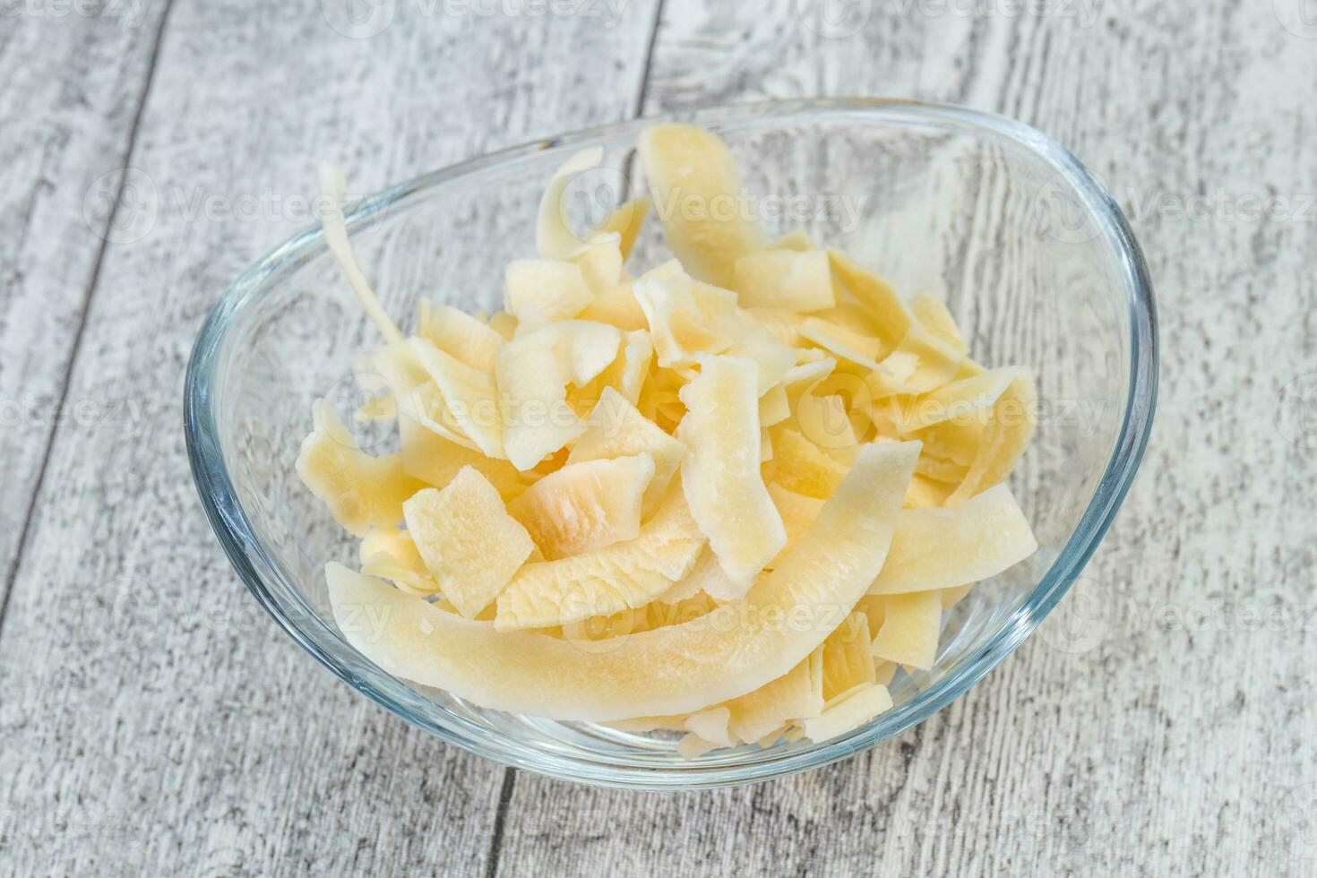 Coconut dry chips in the bowl photo