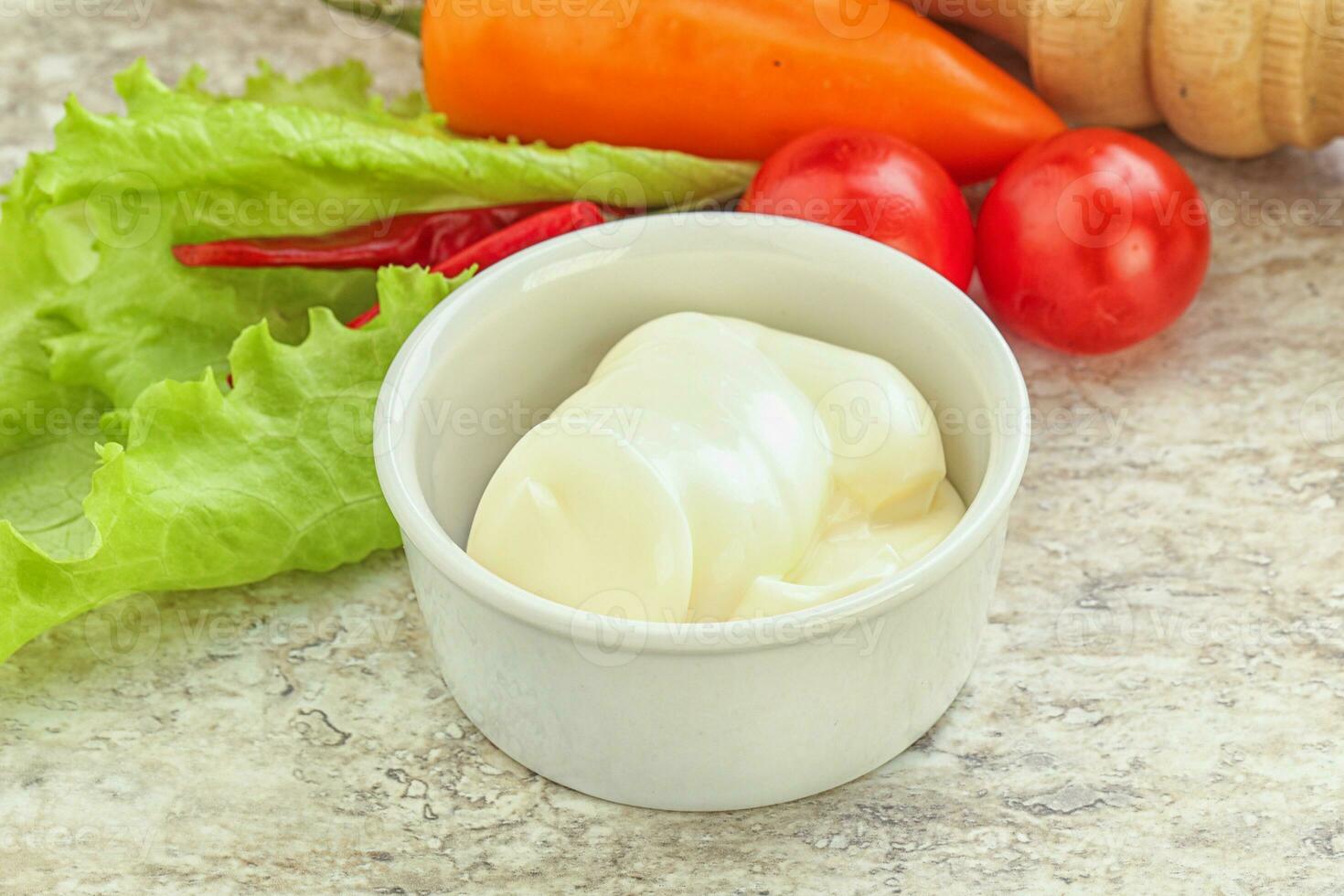 Organic mayonnaise sauce in the bowl photo